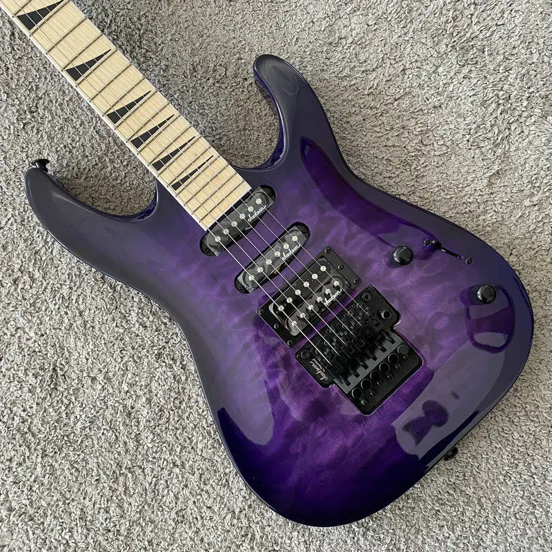 Фото Электрогитара Jackson JS34Q Dinky Arch Top, 24 лада, кленовый гриф, HSS, с рёхолистной декой, тремоло Floyd Rose, прозрачный фиолетовый цвет №2