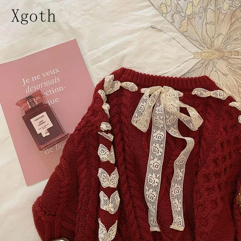 Женский трикотажный пуловер в стиле оверсайз с бантом