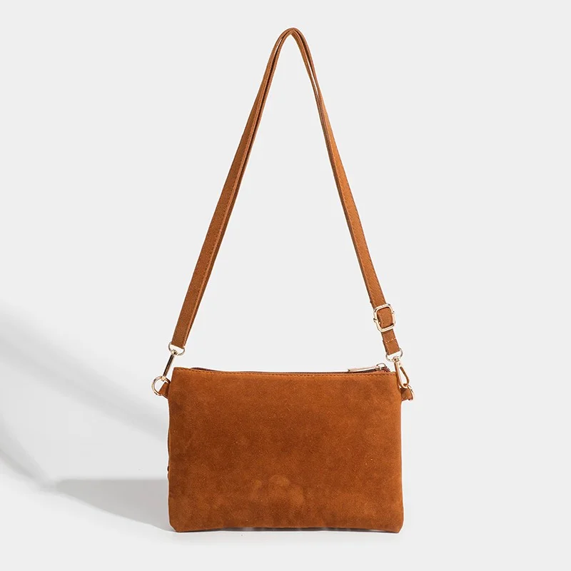 

Женская сумка через плечо, модная трендовая новая сумка для покупок на молнии большой вместимости, однотонная замшевая женская сумка через плечо с кисточками