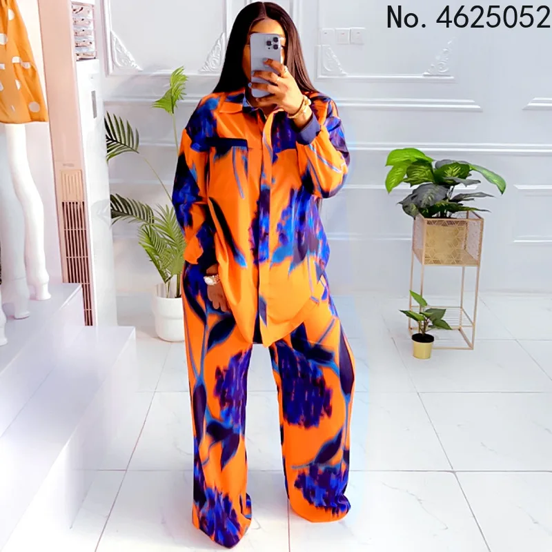 

Лето 2022, модный Африканский Женский комплект из двух предметов с длинным рукавом, V-образным вырезом и принтом из полиэстера, топ и длинные б...