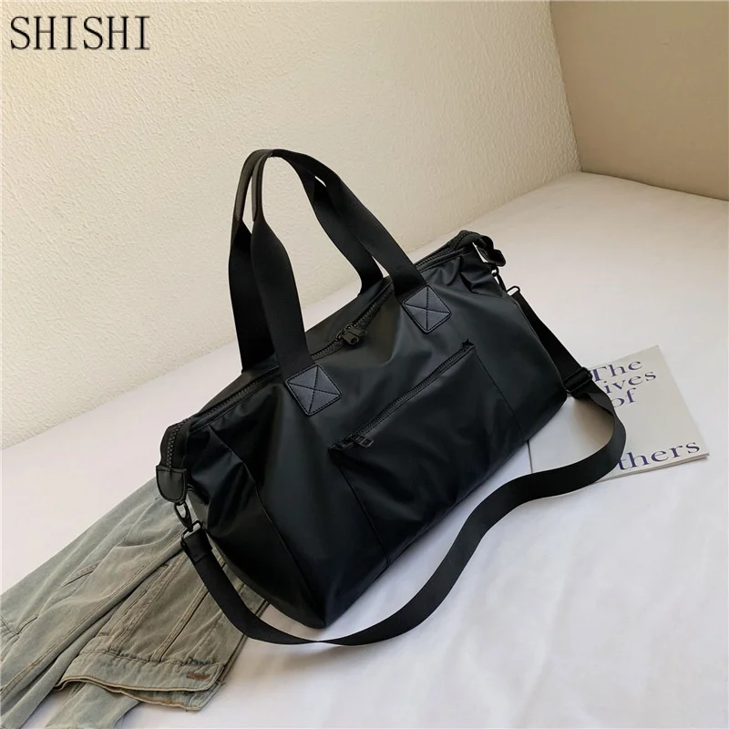 

Large Capacity Men and Women Travel Bag Waterproof Gym Fitness Bag Male Luggage Bag Nylon Handbags Fashion Duffle BagsBags