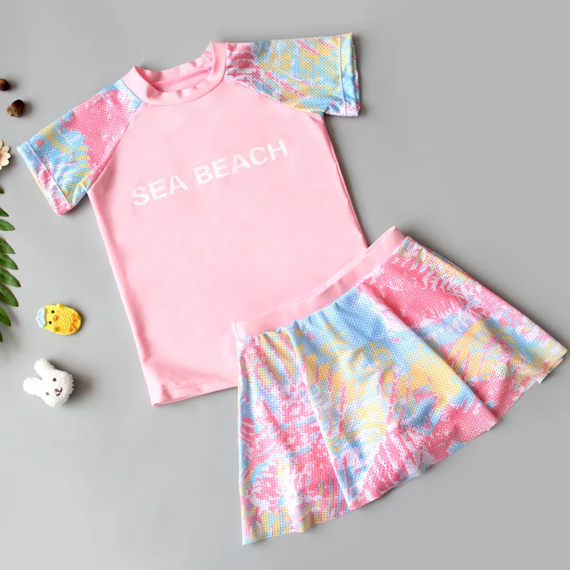 Костюм купальный детский из юбки с длинным рукавом и цветочным принтом на