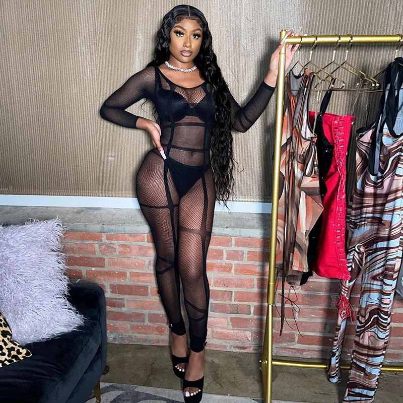 

Woman Long Sleeve Fishnet Hole Jumpsuit Solid Color Stripes See Through Sexy Bodysuit Free Size
