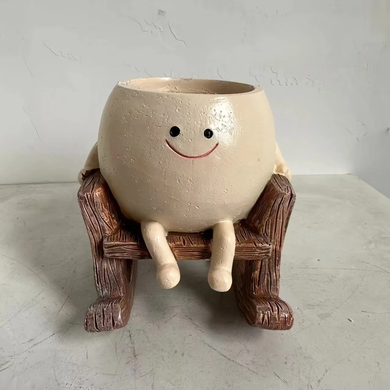 

Цветочный горшок-смайлик из смолы