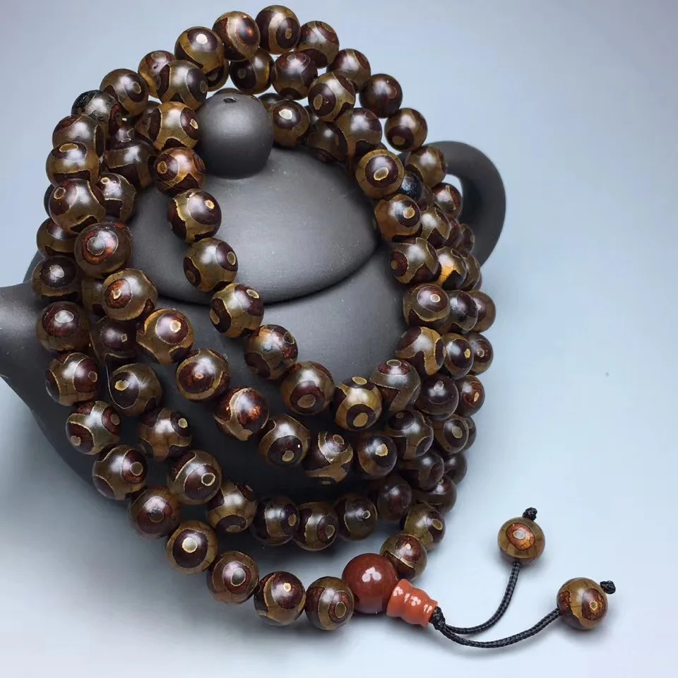Четки сандал. Буддийские бусины. Четки 108 бусин сандал. Тибетские четки 108 дерево венге. Тибетские буддийские бусы.