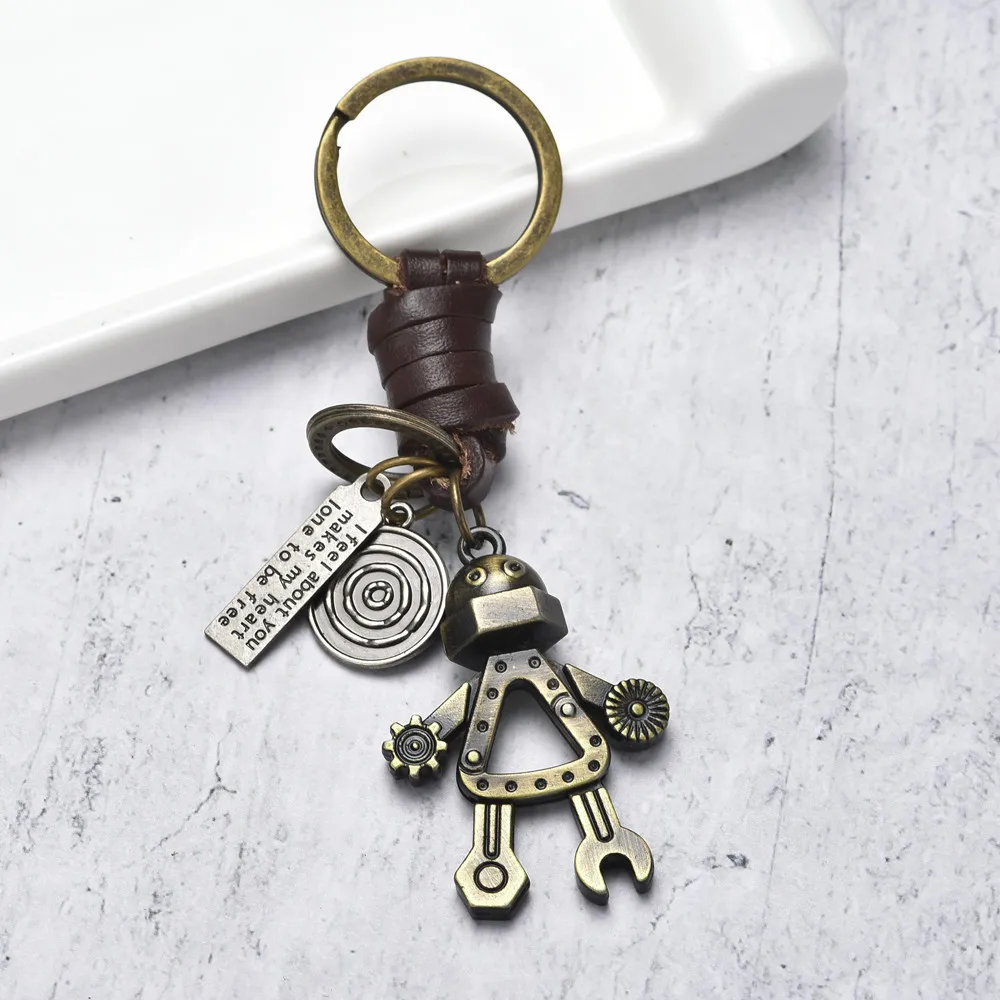 Vintage woven cowhide keychain, simple and personalized, cute robot pendant, car key pendant
