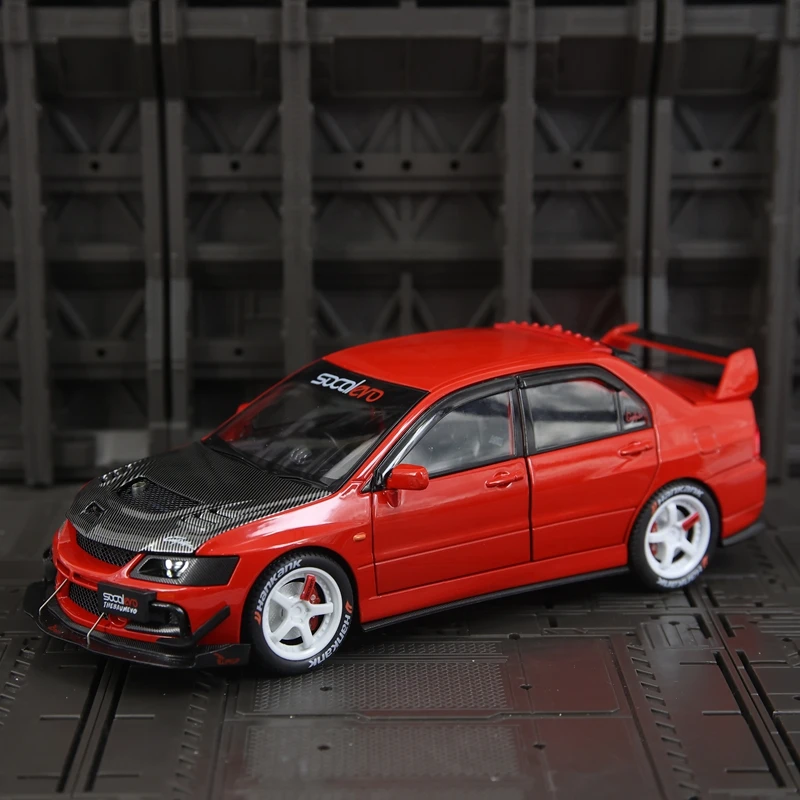 Фото Модель автомобиля Mitsubishi EVO 9 в масштабе 1:24, из сплава, с открывающимися дверями, капотом и багажником, богато детализированная, тонкая работа. №5