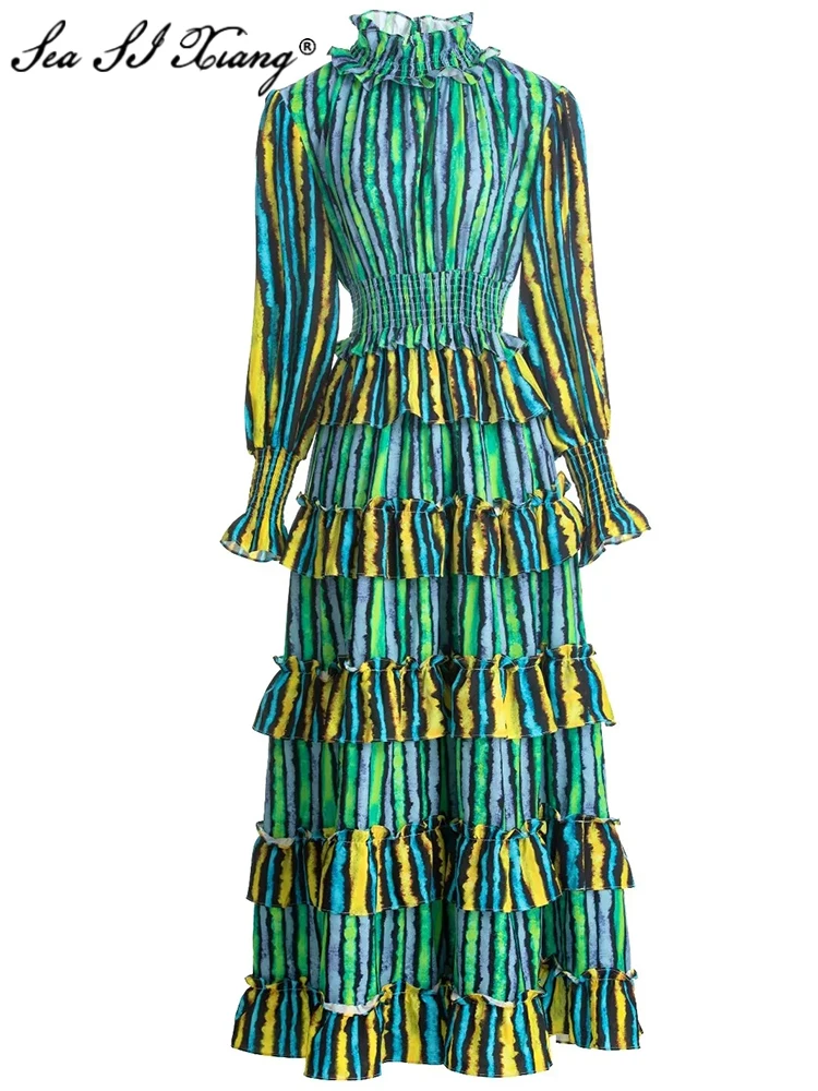 

Женское платье с воротником-стойкой, рукавами-фонариками и оборками