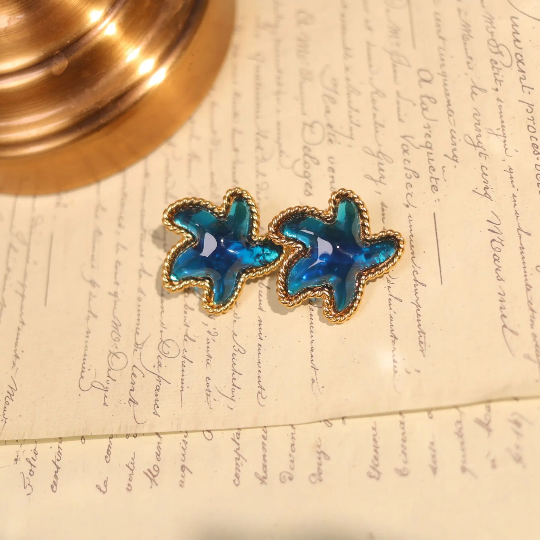 

Medieval fashion blue glazed starfish new glazed hollow retro ear clip