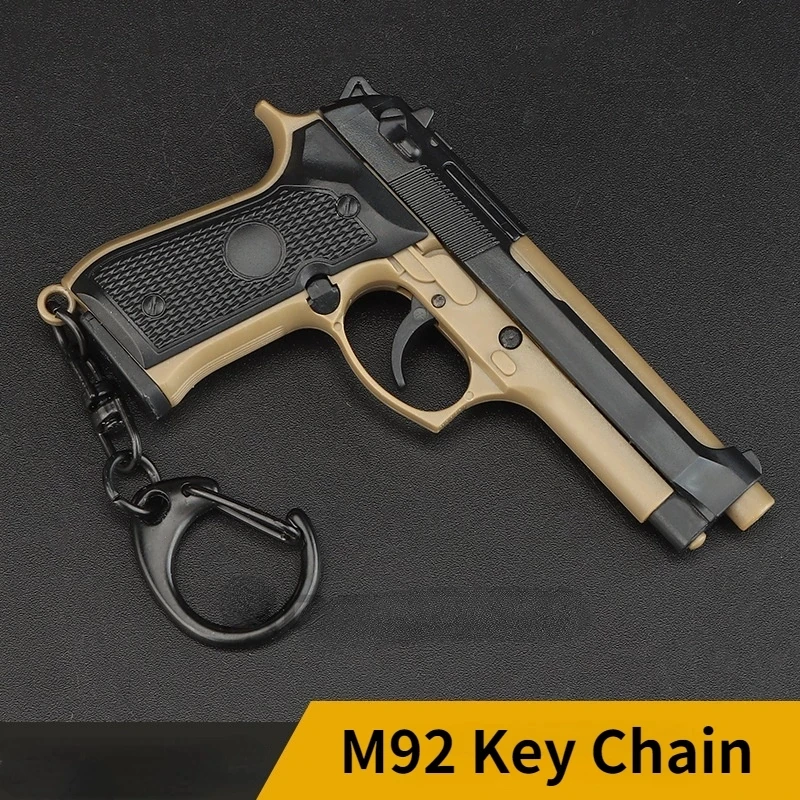 

1:4 Beretta 92G Pistol Miniatures Plastic Removable Mini Fake Gun Model Keychain Pendant Room Home Decoration Accessories Modern