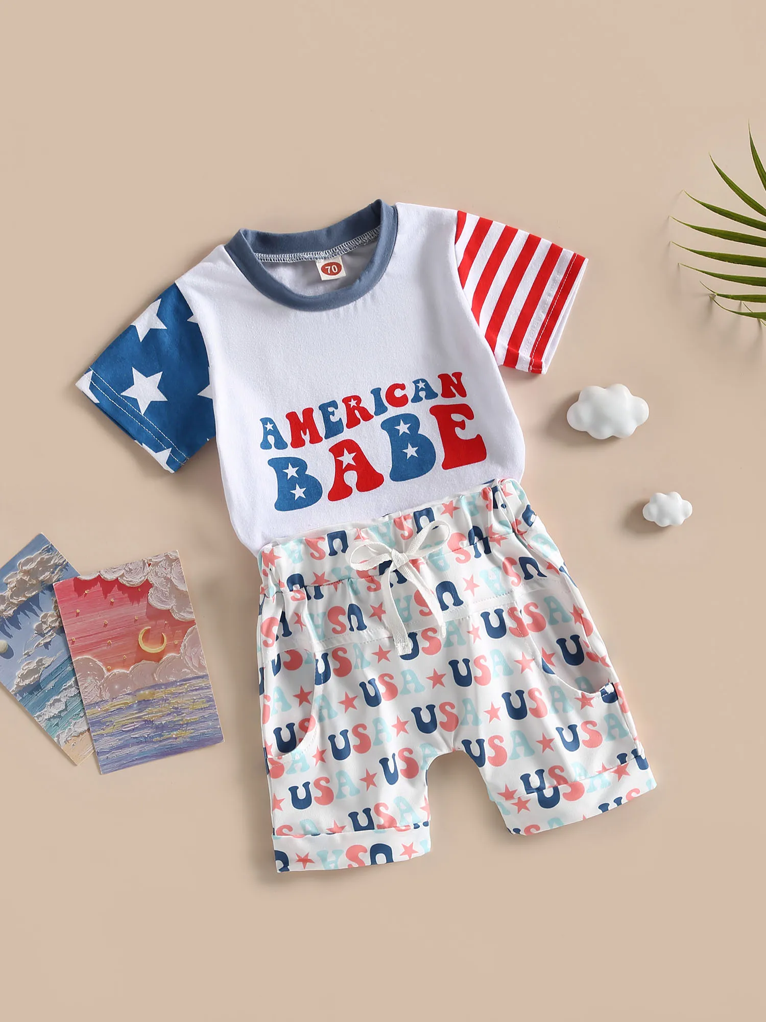 

Детский комбинезон с цветочным принтом, с оборками на рукавах