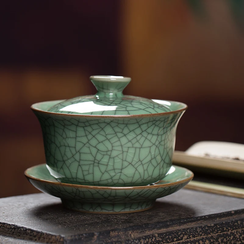 

Longquan Celadon Sancai Gaiwan Tea Cup Single Tea Bowl Kung Fu Tea Set Ge Kiln Ice Crack Not Hot Household Tea Brewing Bowl