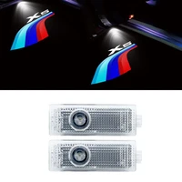 2 pieces led car door light for bmw e53 e70 f15 g05 x5 logo welcome light auto hd projector lamp automobile external accessories