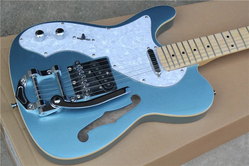

The factory's new backhand single F air crank electric guitar and white pearl guard can be made as required