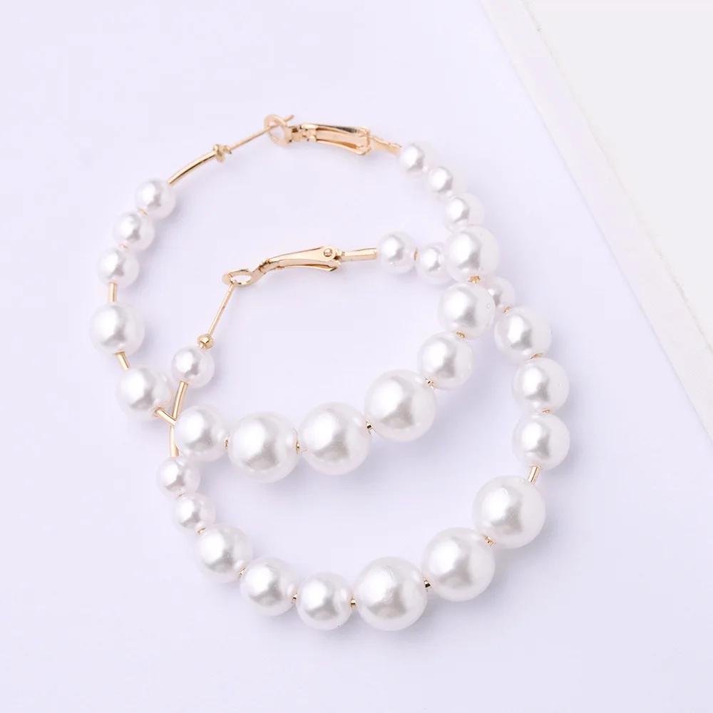 

Large and small pearl beaded large circle earrings Simple personality beaded temperament earrings