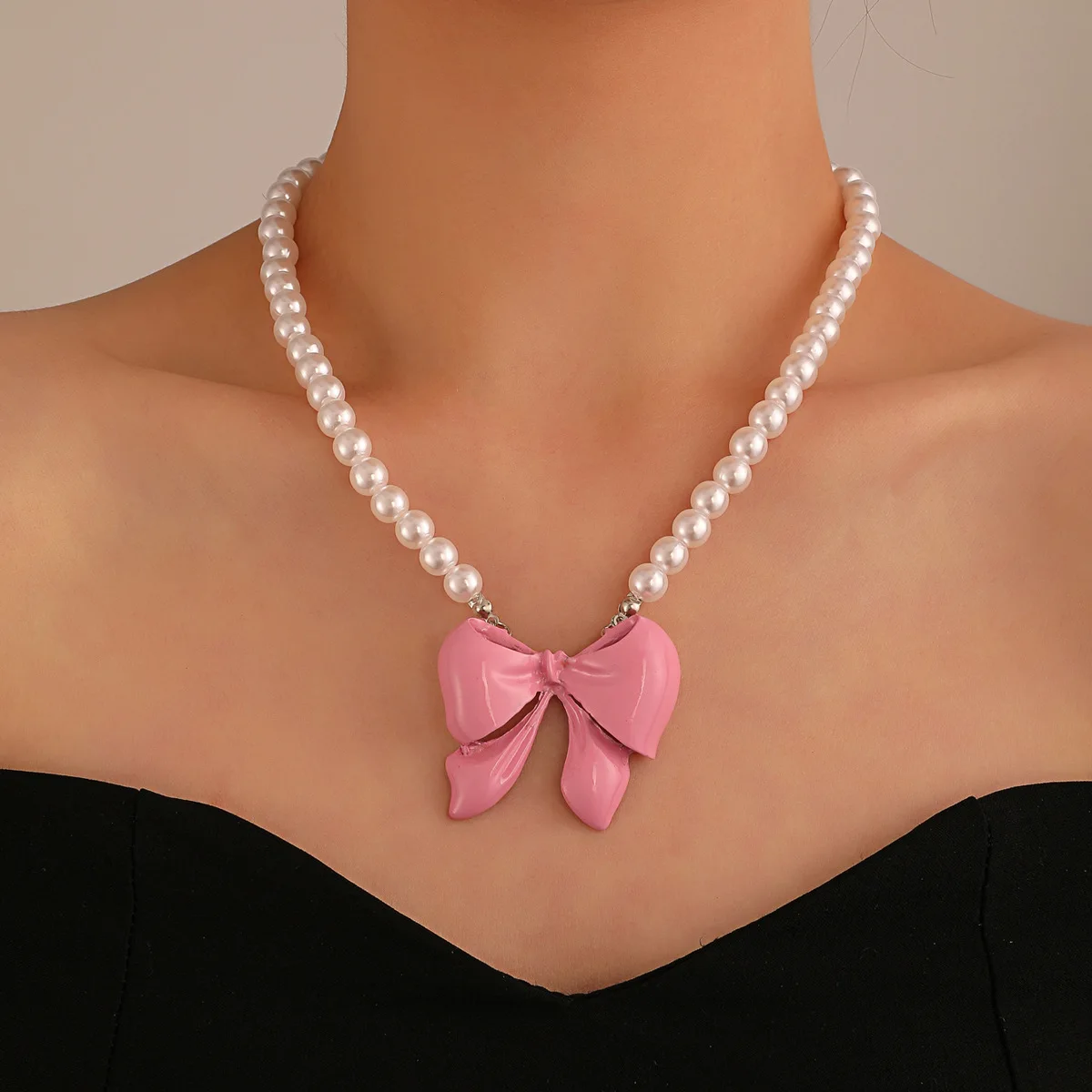 

South Korea's East Gate Bow Knot Polarized Pearl Necklace Fashionable, Light Luxury, Clavicle Necklace Elegant Woman