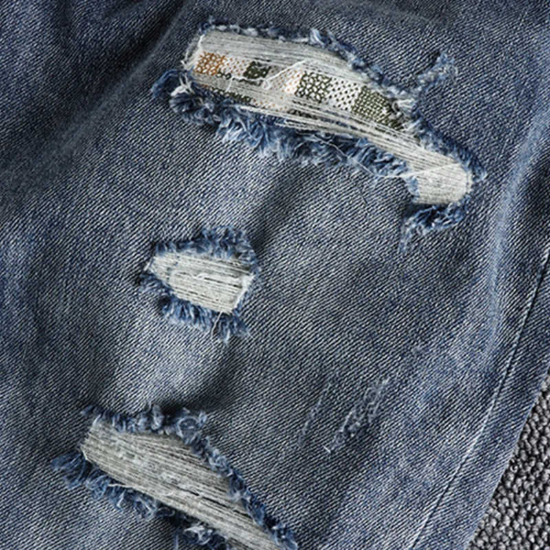 With a belt, vintage blue jeans, slim fit, snug little bullet hole, teeny feet