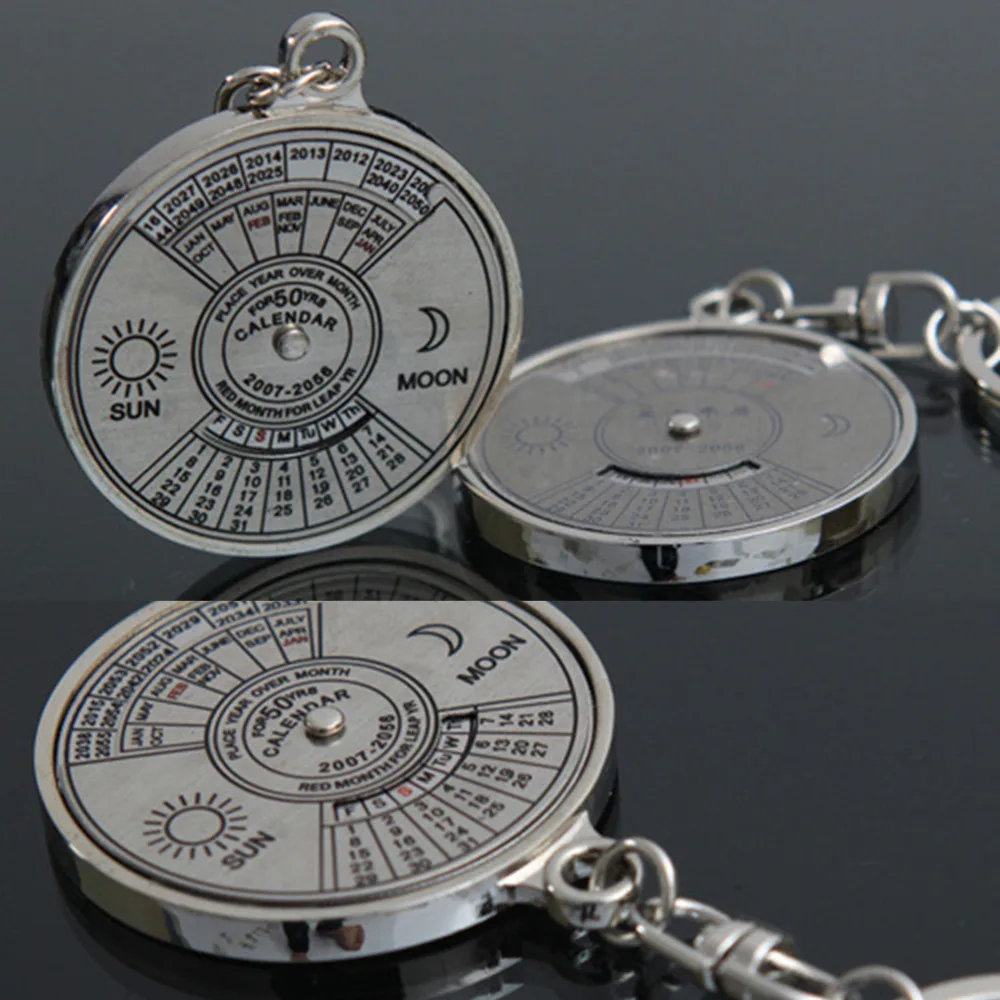 

1Pcs/lot Hiking Camping Outdoor Sports Survival Compass Metal Ring Compass 50 Year Calendar Keychain Keyring Keyfob