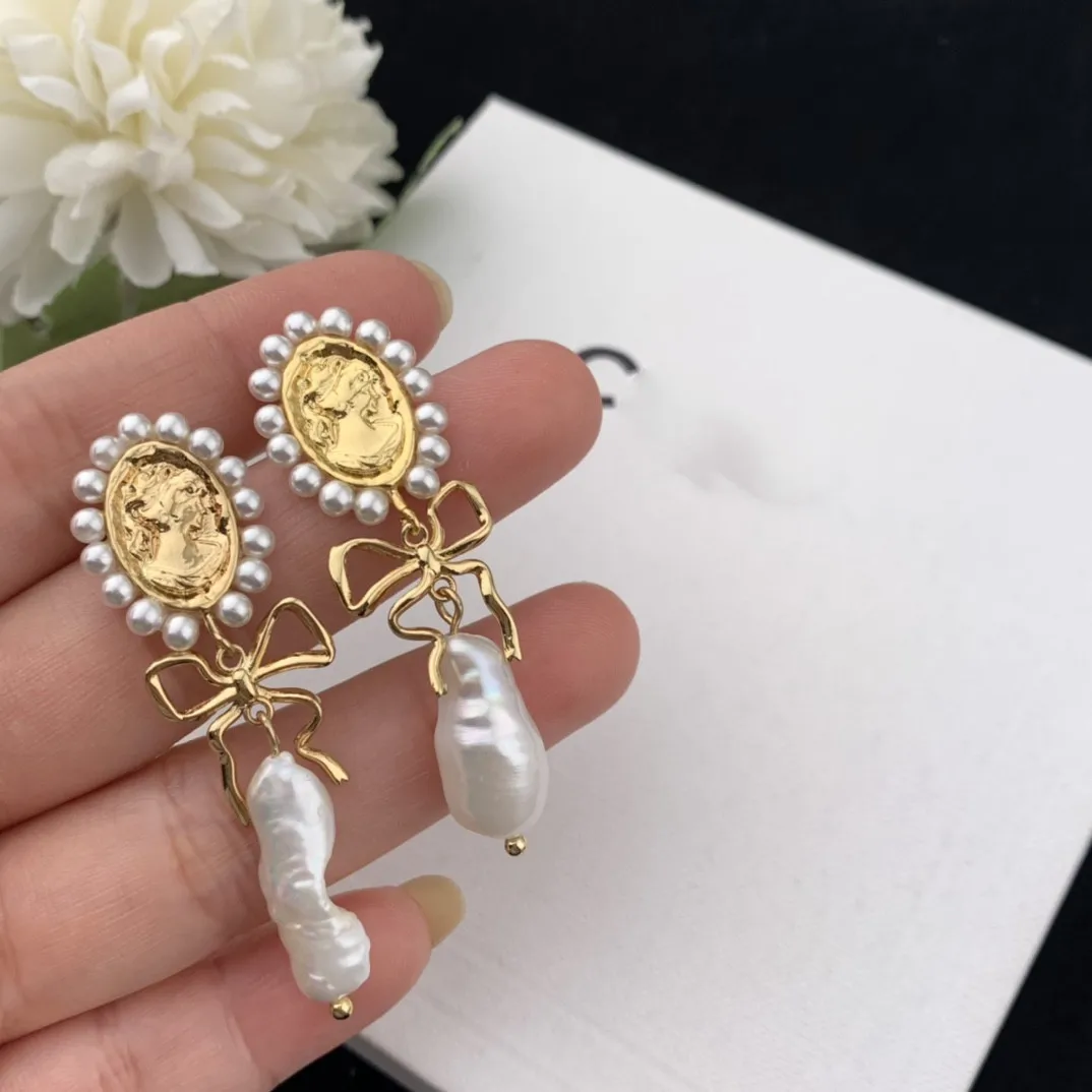 

European and American Bow Irregular Pearl Earrings