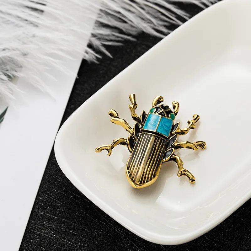 

Fashion trend temperament atmosphere personality creative wild drip oil retro beetle brooch accessories