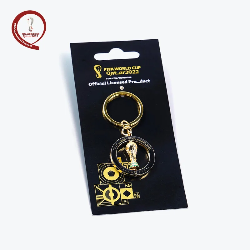 

Вращающаяся трехмерная золотая цепочка для ключей Кубка мира в Катаре 2022