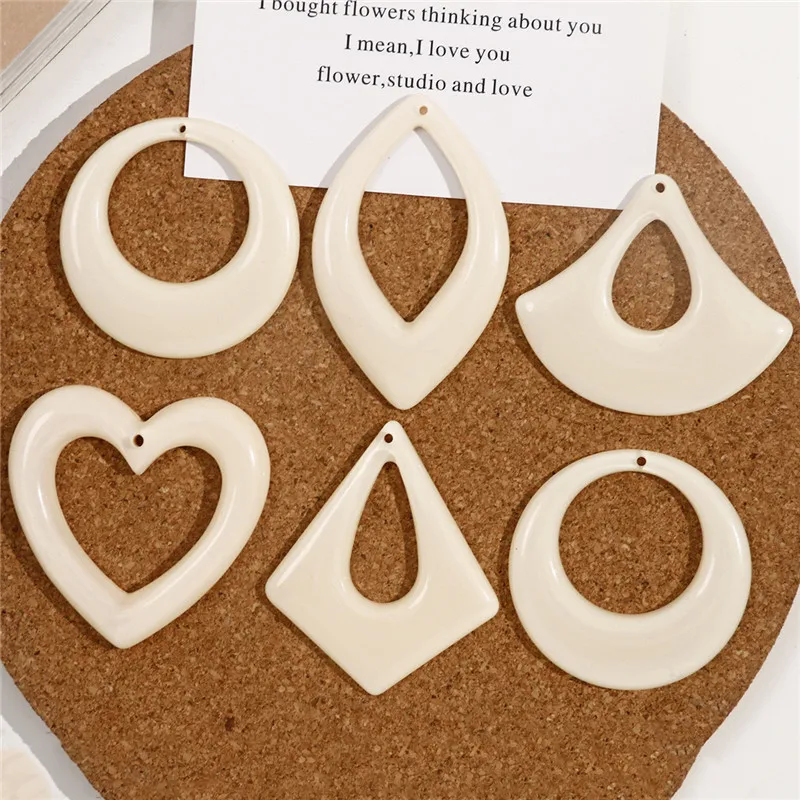 

Wholesale 40pcs/lot cream color print geometry hearts/rounds/leaves shape resin beads diy jewelry earring/garment accessory