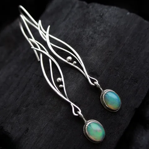 Серьги-подвески NovoPublic серебристого цвета