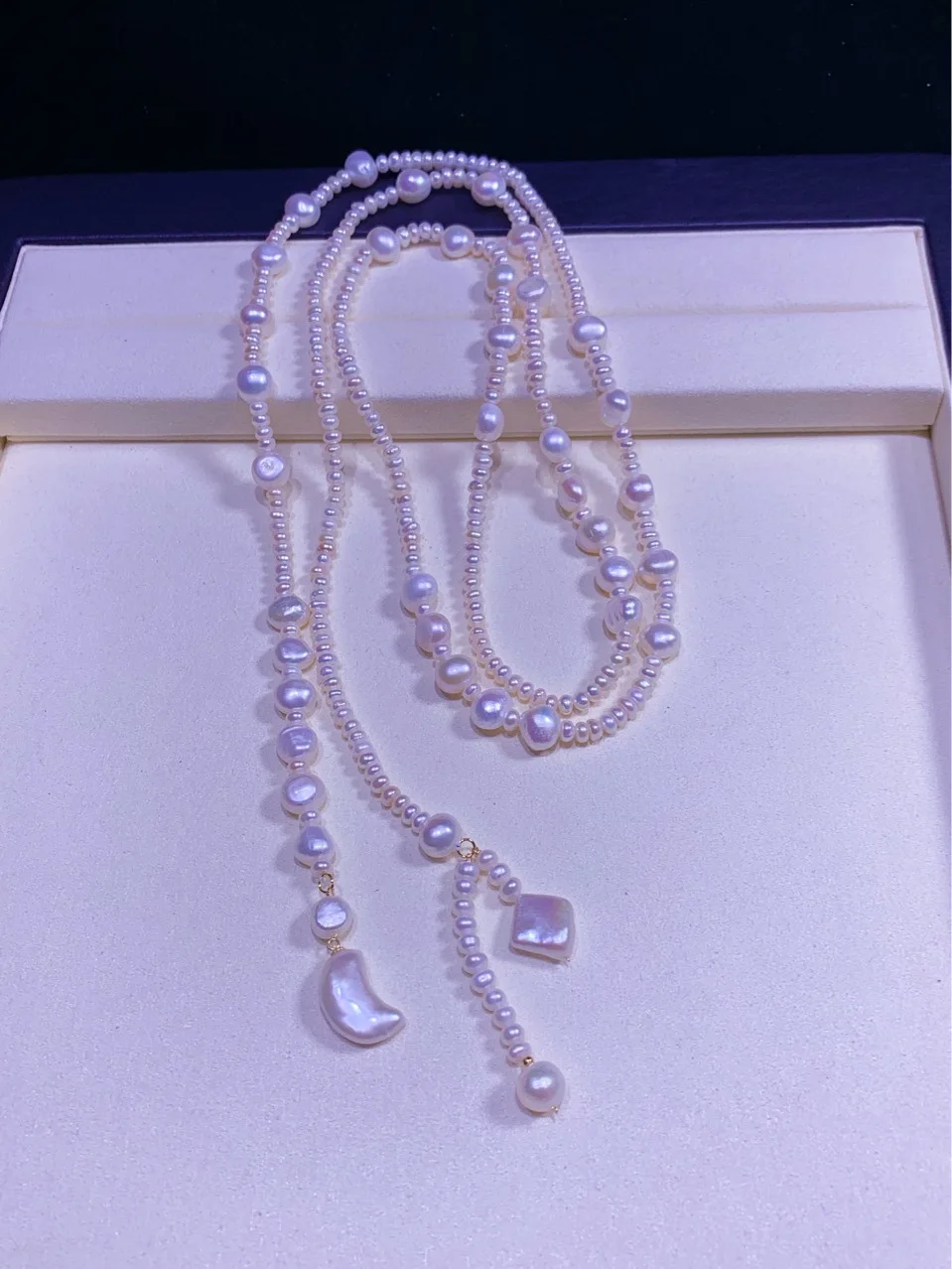 

Moon and baroque freshwater shaped pearl necklace female light luxury niche 120 cm sweater chain design feeling fashion model