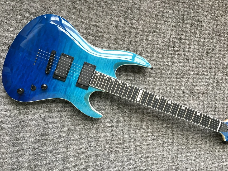 

Electric guitar, blue color ESP guitar, ebony wood fingerboard, quilted maple top 2 pickups, black accessories, 3 volume a
