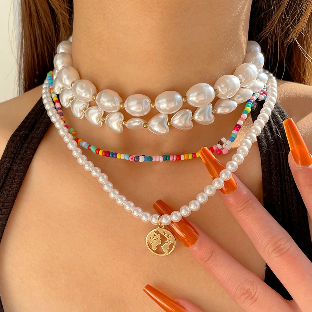 

Elegant White Pearl Beaded Chokers Clavicle Chain Necklace For Women Mini Hollow World Map Pendant Pearl Necklace Trendy Jewelry