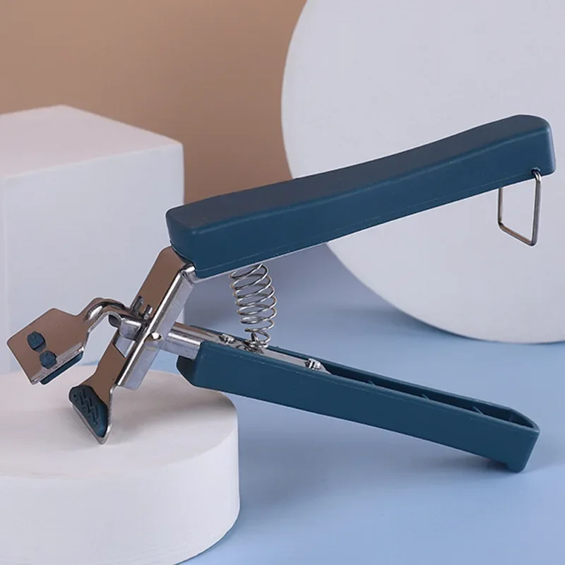 

Противоожоговый зажим для мисок из нержавеющей стали