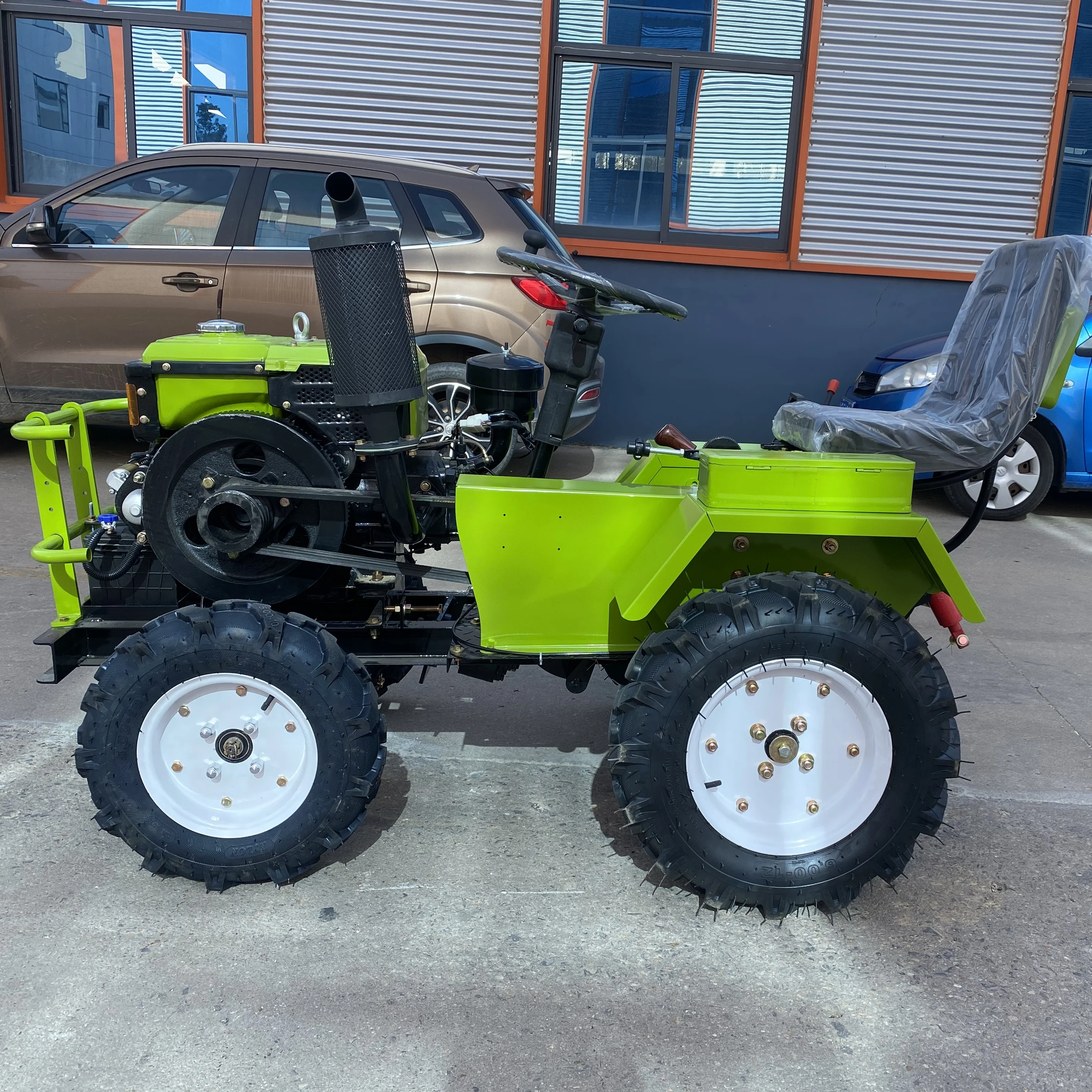 Фото Компактный мини-трактор 4WD с дизельным двигателем, полноприводный (4x4) для небольших ферм и садов №2