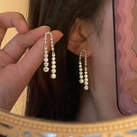 french lazy style design sense of personality light luxury pearl zircon earrings long tassel earrings new trend