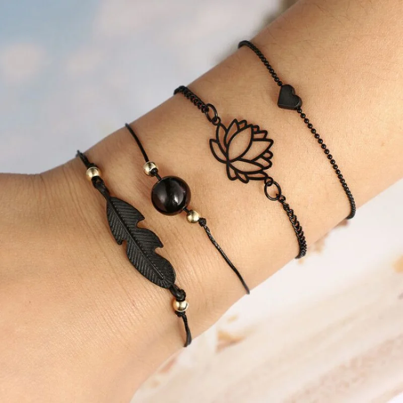 

4PCs Gothic Black Feather Lotus Bracelets Set Heart Charm Boho Black Bangles For Women Wrist Chain Bracelets New Fashion