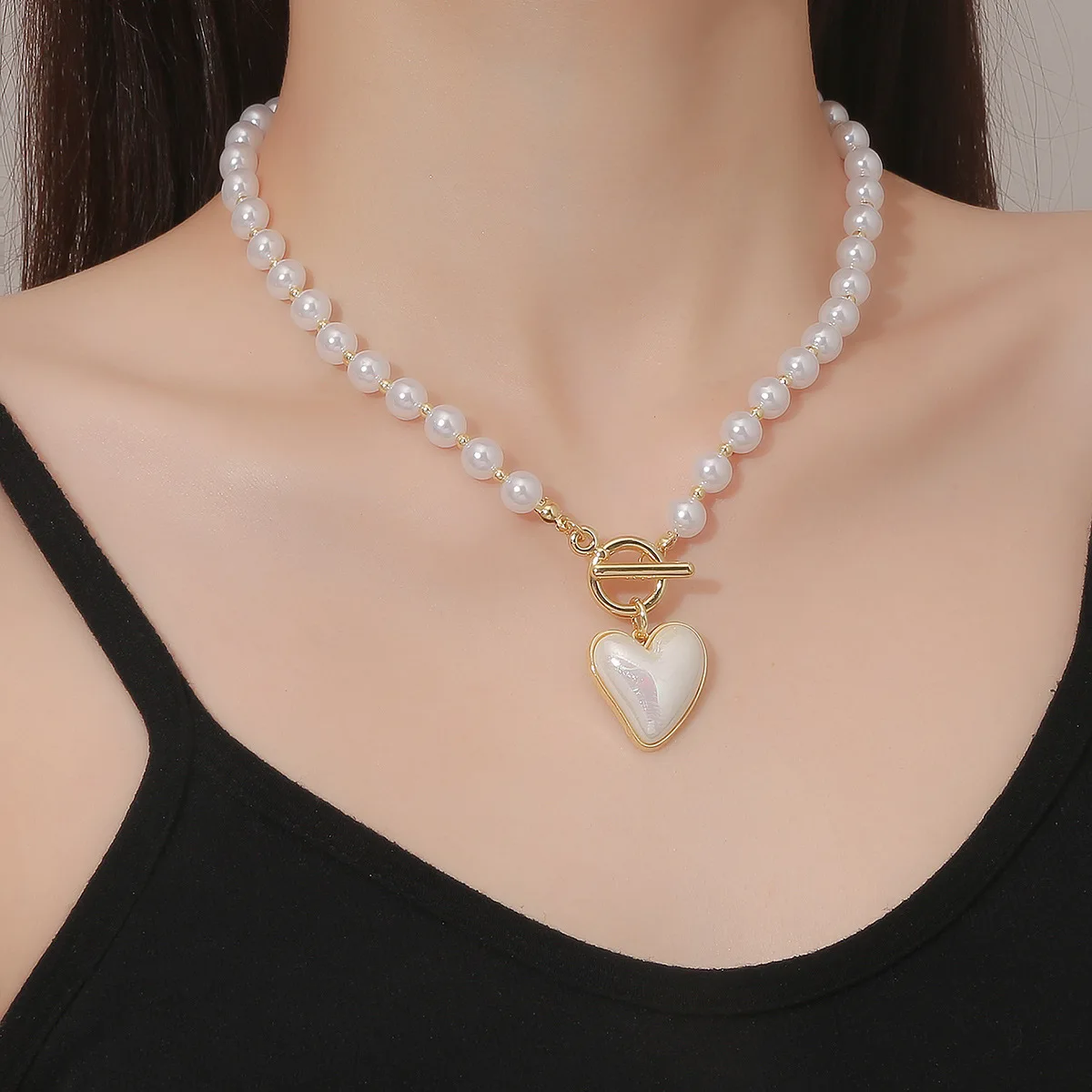 

Hot Selling Pearl Jewelry Necklaces Are Designed In Europe,the American and YEATION Baby Necklaces.Women's Love Pearl Necklace
