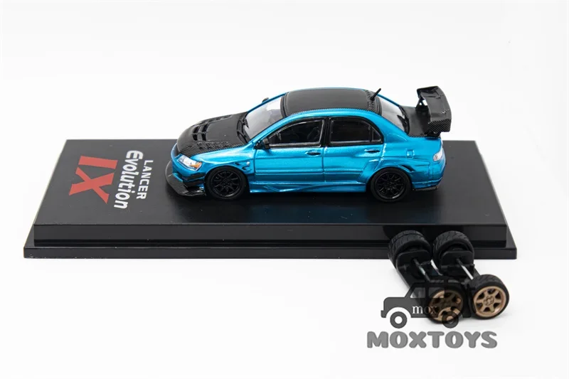 CM Модель 1:64 Lancer Evoix Металлический синий Карбон