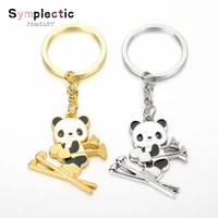 symplectic metal ski panda keychain cartoon sports bear pendant car zero bag decoration gift golden bear key ring for womens