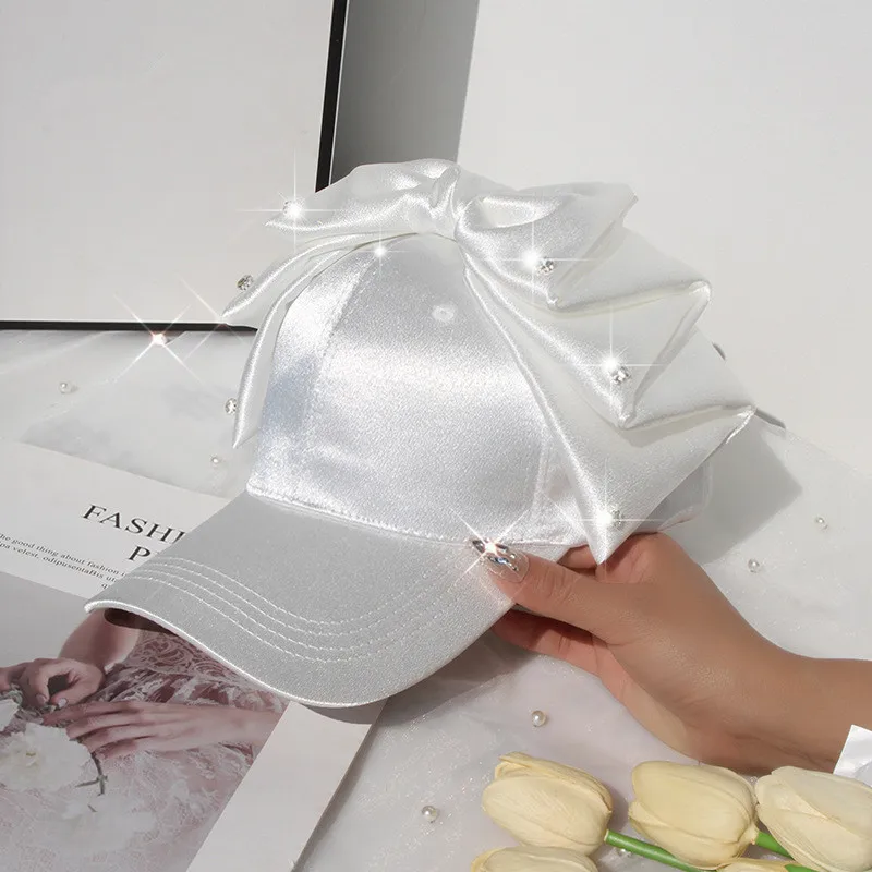 

202306-shi ins facebook Satin drill big Bowknot street fashion leisure lady baseball hat women leisure visors cap