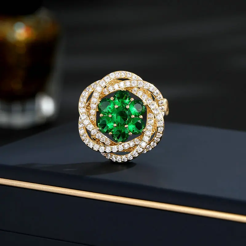 

Zircon Inlaid Flower Brooch with Crossed Lines