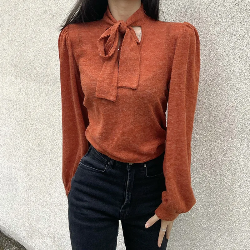 

Autumn and Winter 2023 Fashion Women's New Solid Color Temperament Long-sleeved Hollow Round Neck Tie Pullover Slim Knit Top