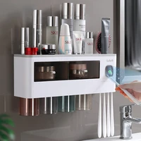 upward magnetic adsorption toothbrush holder automatic toothpaste extruder home wall installation bathroom accessories