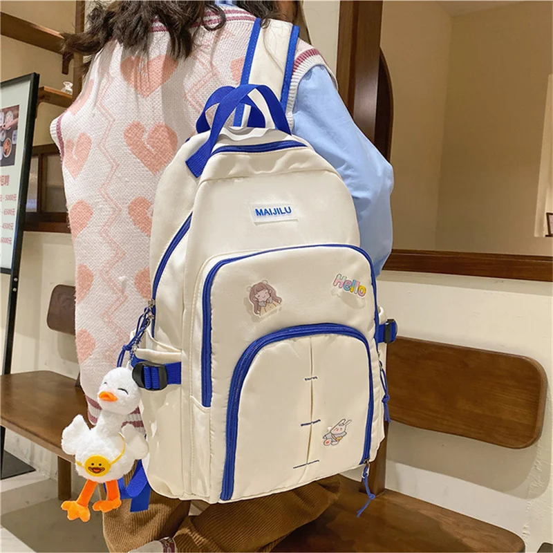 

2022 Student Book Bag Solid Color Women's Backpack Large Capacity Travel Backpack College Style Schoolbag