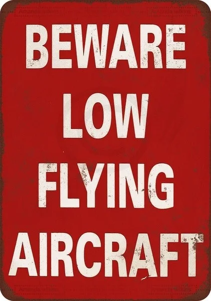 

Novelty Sign Beware Low Flying Aircraft Reproduction Metal Sign