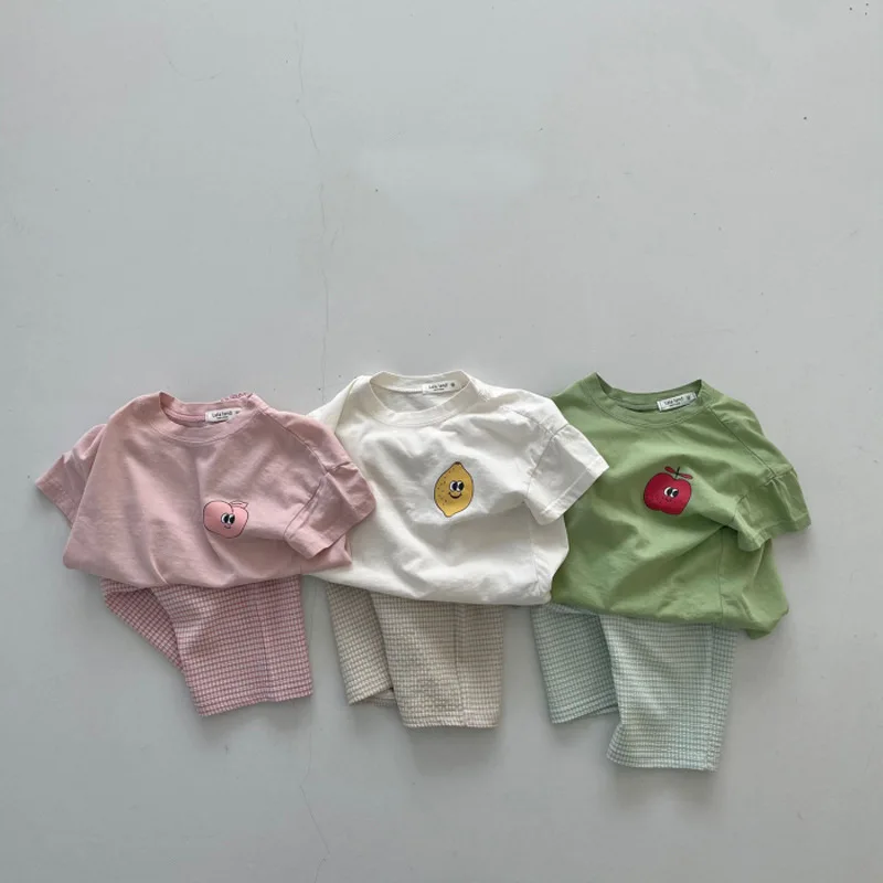 

Летняя версия детской одежды Ins хлопковый освежающий костюм с фруктами с коротким рукавом Повседневная футболка капри брюки 302