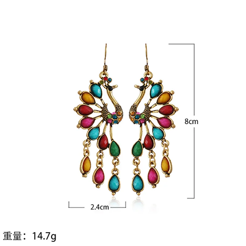 

Creative peacock ethnic style hollow earrings personality European and American earrings dark green studded gold earrings עגילים
