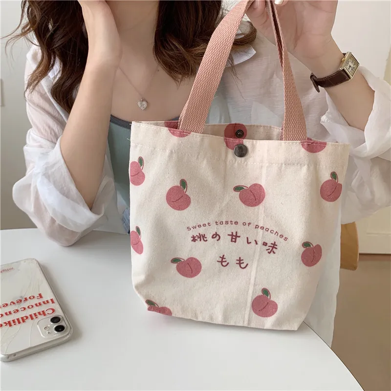 

Japanese kawaii Shopper bag ins large capacity peach print women shoulder bag fashion letter Vintage female canvas bag