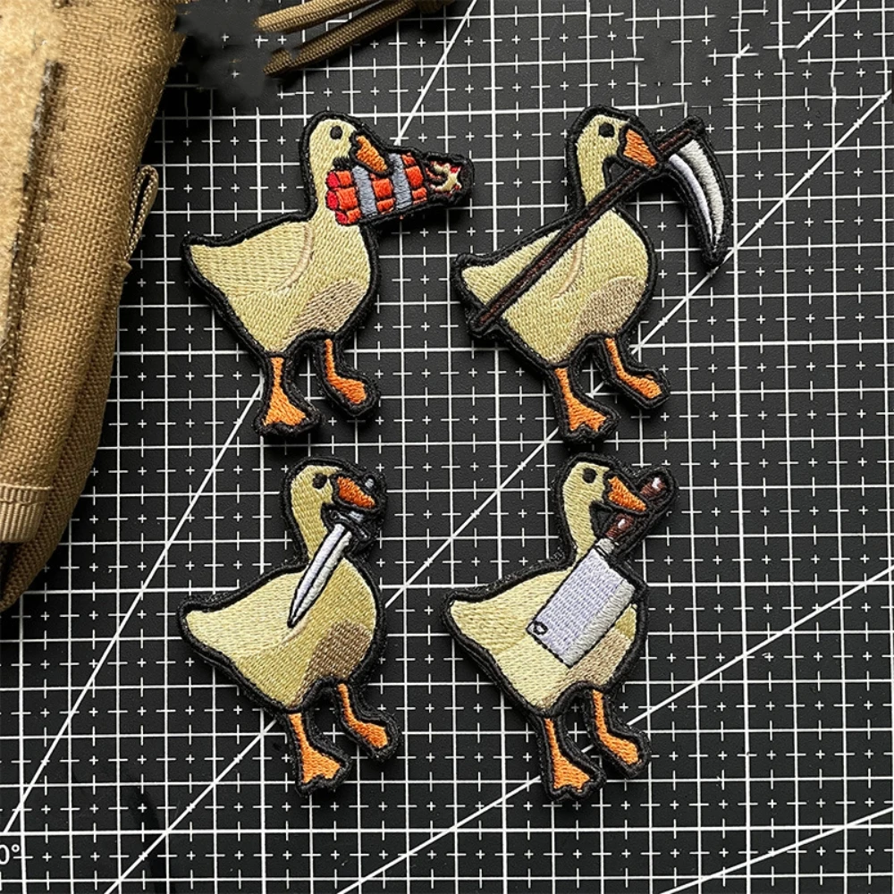 

Game Embroidery Patch Cartoon Goose Morality Emblem Sticker Big Goose Biting Knife Backpack Hook and Loop Patches for Clothing