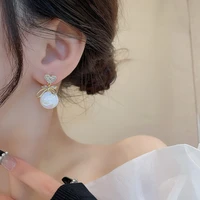 light luxury zircon earrings female mermaid pearl earrings retro jewelry for women boho bride korean bow tie ear studs dangler