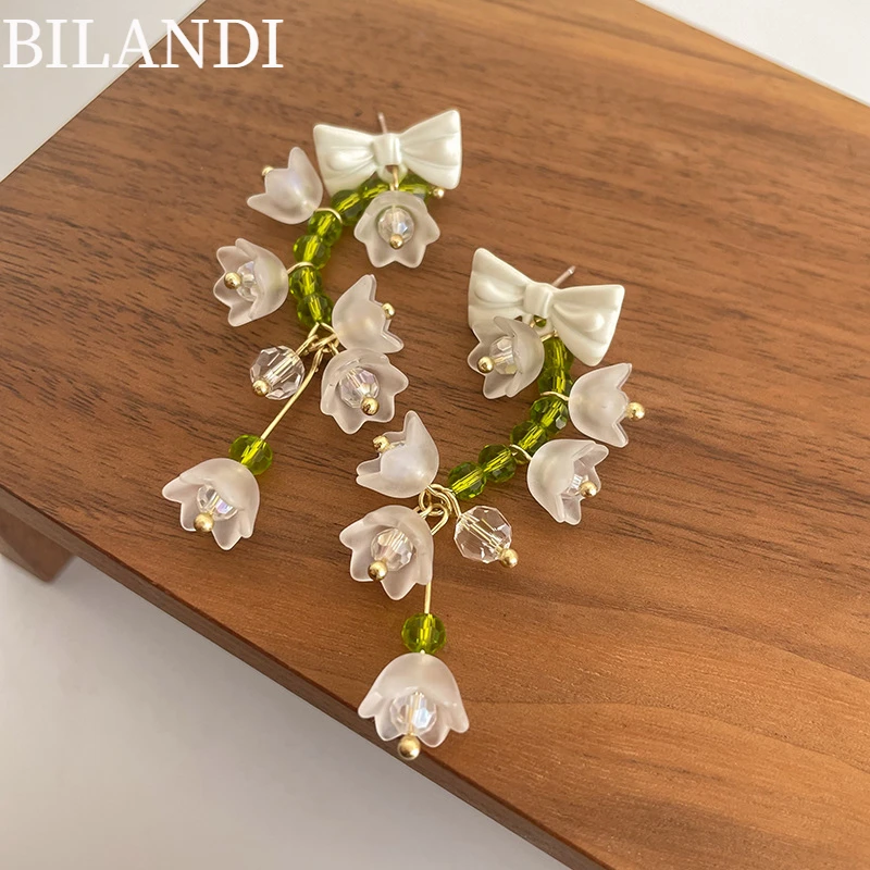 

Bilandi Trendy Jewelry S925 needle White Bowknot Earrings Sweet Korean Temperament Green Beads Flower Drop Earrings For Women