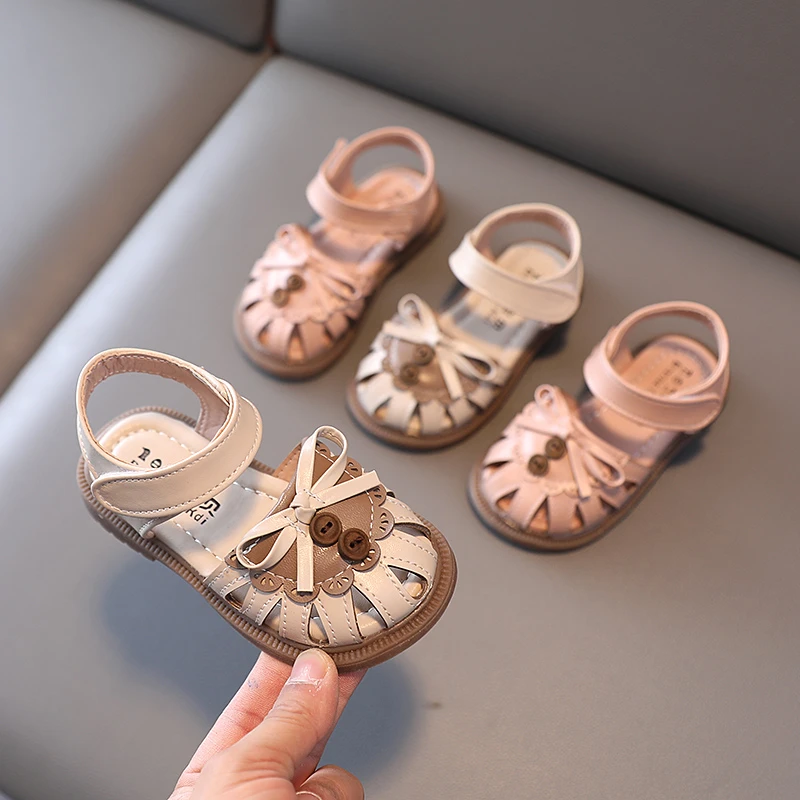 

Милые однотонные босоножки принцессы с бантом и пуговицами, кружевные французские милые ретро сандалии для девочек, детская модная универсальная Повседневная летняя обувь 2023